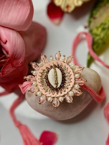 Handcrafted Cowri Pastel Color Rakhi With Roli-Chawal