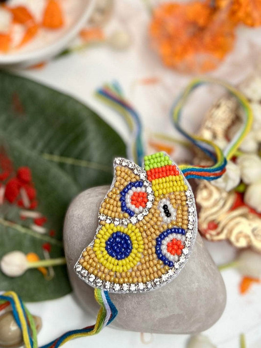 Handcrafted Ganpati Rakhi With Roli-Chawal