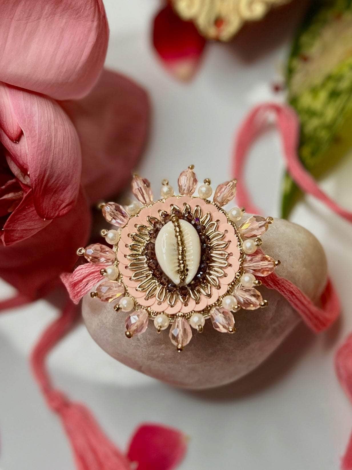 Handcrafted Cowri Pastel Color Rakhi With Roli-Chawal