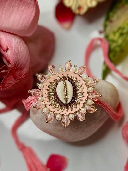 Handcrafted Cowri Pastel Color Rakhi With Roli-Chawal