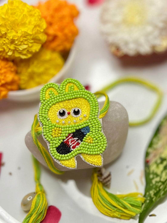 Handcrafted Labubu Green Color Kids Rakhi With Roli-Chawal