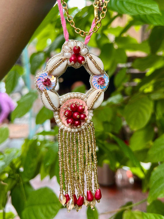 Handcrafted Pearl & Cowri Studded Lumba Rakhi With Roli-Chawal