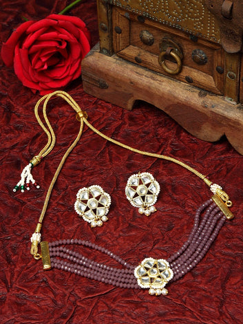 Gold-Plated Purple & White Kundan & Onyx Studded & Pearl Beaded Handcrafted Jewellery Set
