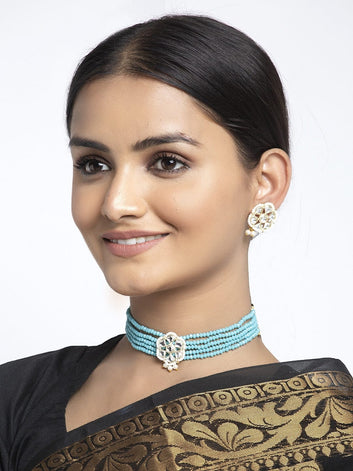 Gold-Plated White & Turquoise Blue Kundan-Studded & Onyx Beaded Meenakari Handcrafted Jewellery Set