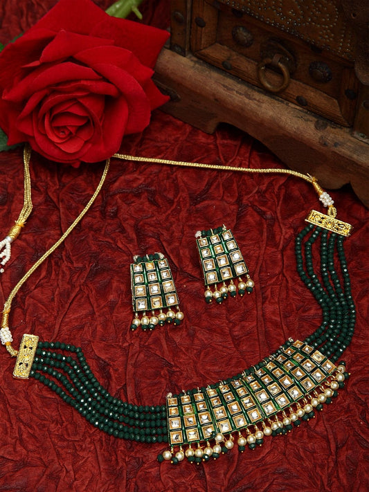 Kundan Pearls and Green Onyx Stones Studded Gold Plated Handcrafted Jewelry Set