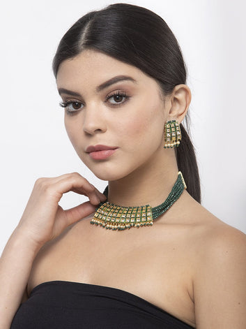 Kundan Pearls and Green Onyx Stones Studded Gold Plated Handcrafted Jewelry Set