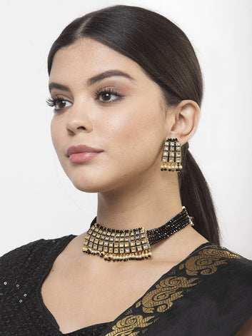Kundan Pearls and Black Onyx Stones Studded Gold Plated Handcrafted Jewelry Set