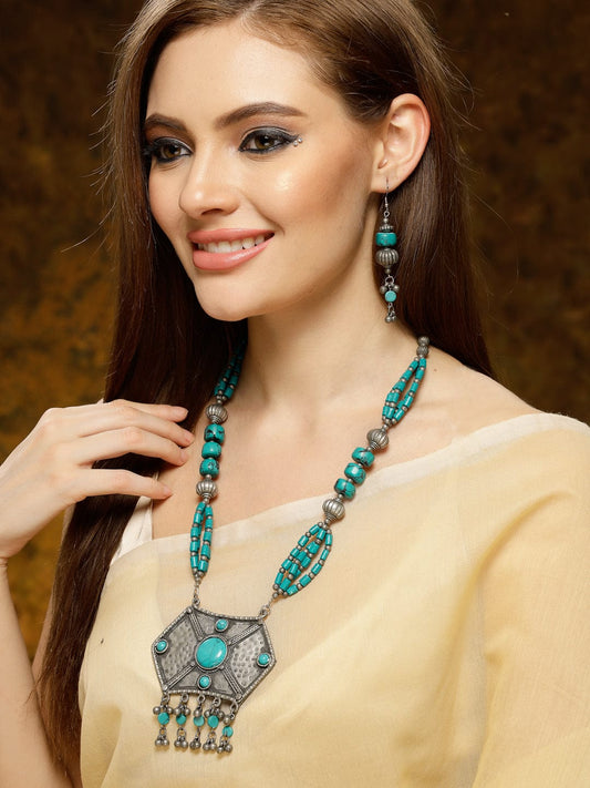 Turquoise Stone Studded Tribal Design Tesseled Pendent Set